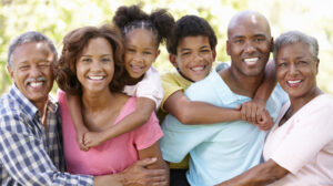 Multi-generational family hugging