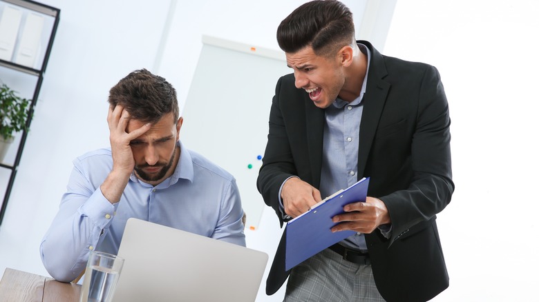 Boss yelling at employee