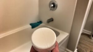 shower tablet with shower in background