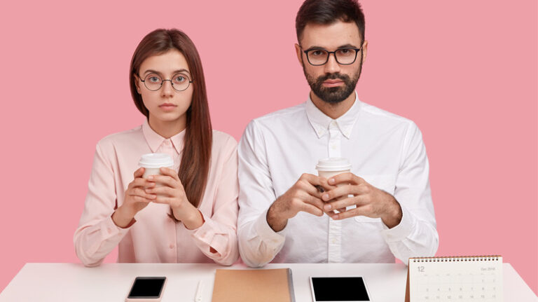 Perfect-looking male and female coworkers