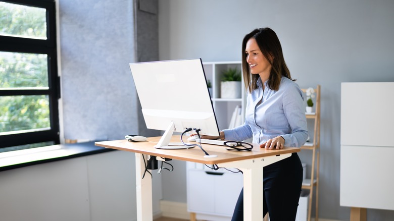 woman at a standing desk