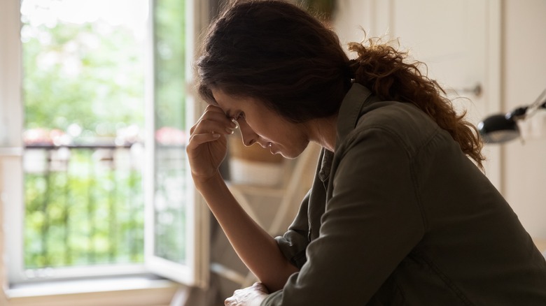 depressed woman looking down