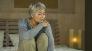 older woman looking depressed