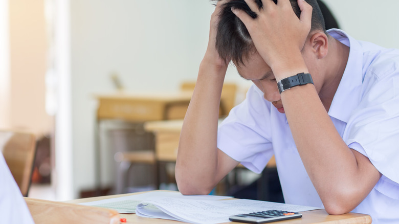 Student with anxiety at desk