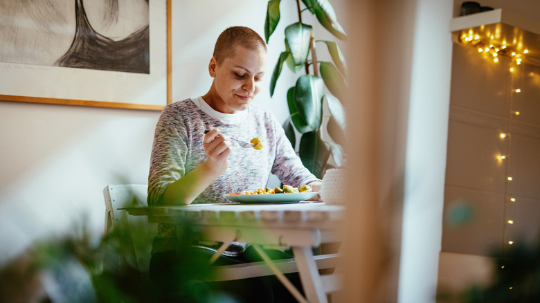 Cancer patient eating high protein meal