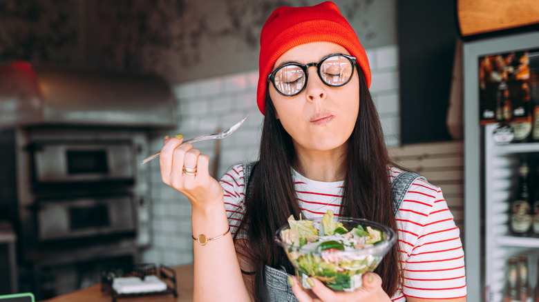 Woman eating a salad