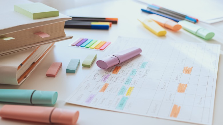 planner and highlighters on table