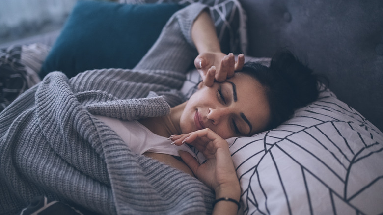 Smiling woman waking up
