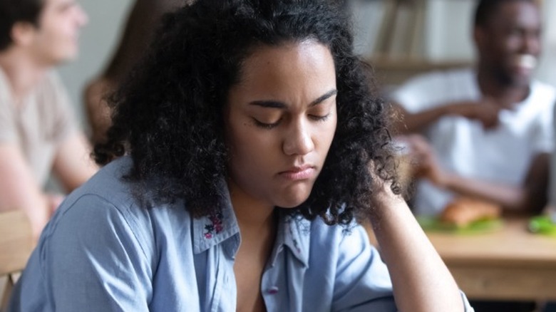 Woman struggling with self-esteem