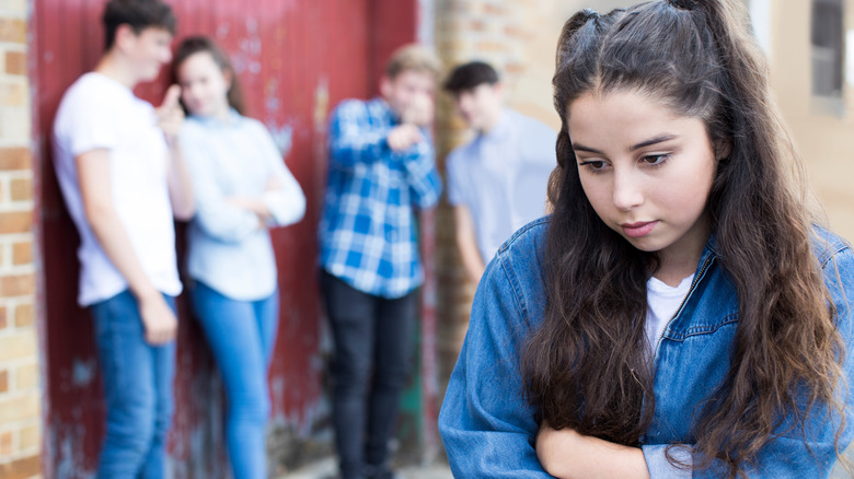 Teen girl being bullied