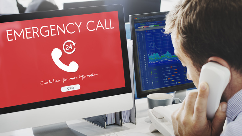 Man making emergency call