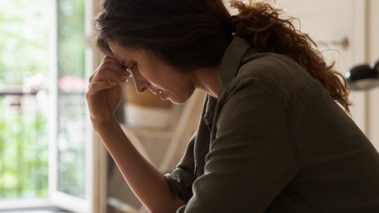 Woman struggling with thoughts