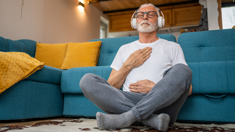Man practicing breathing exercises
